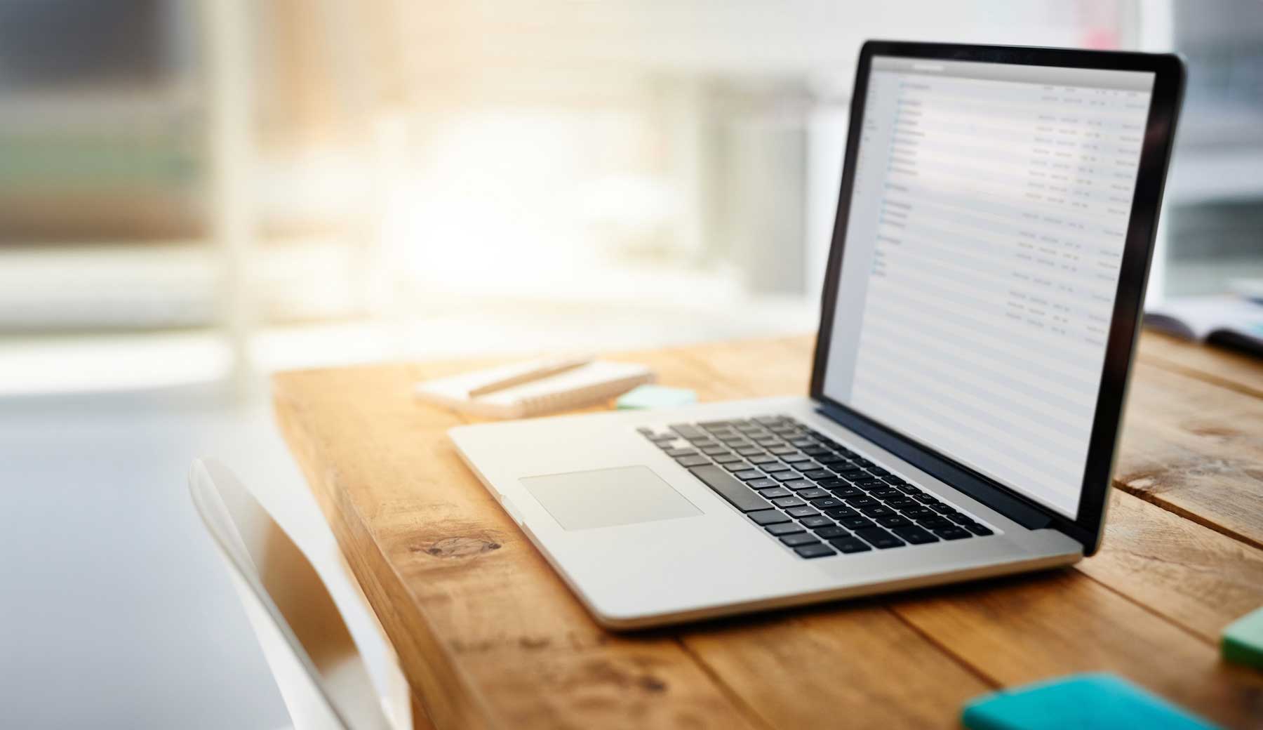 image of laptop sitting on table