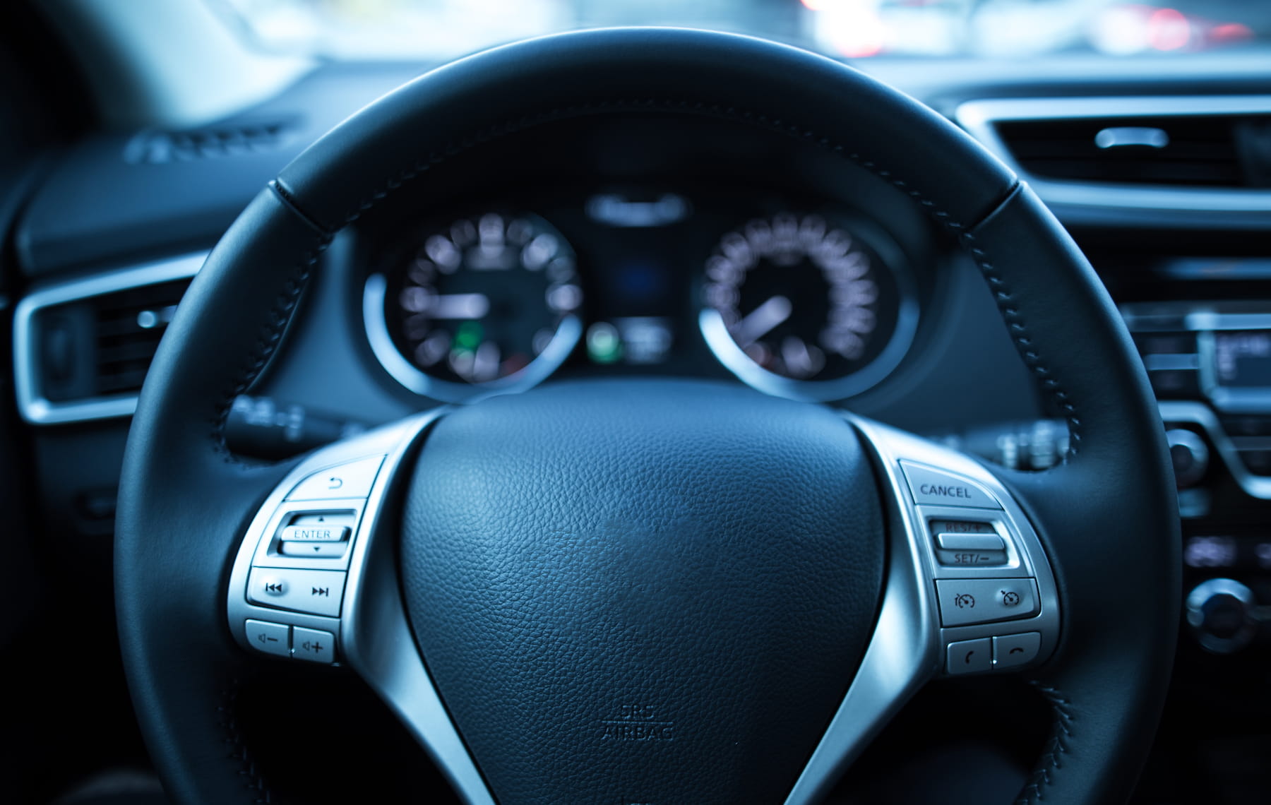 Steering wheel and gauges close up